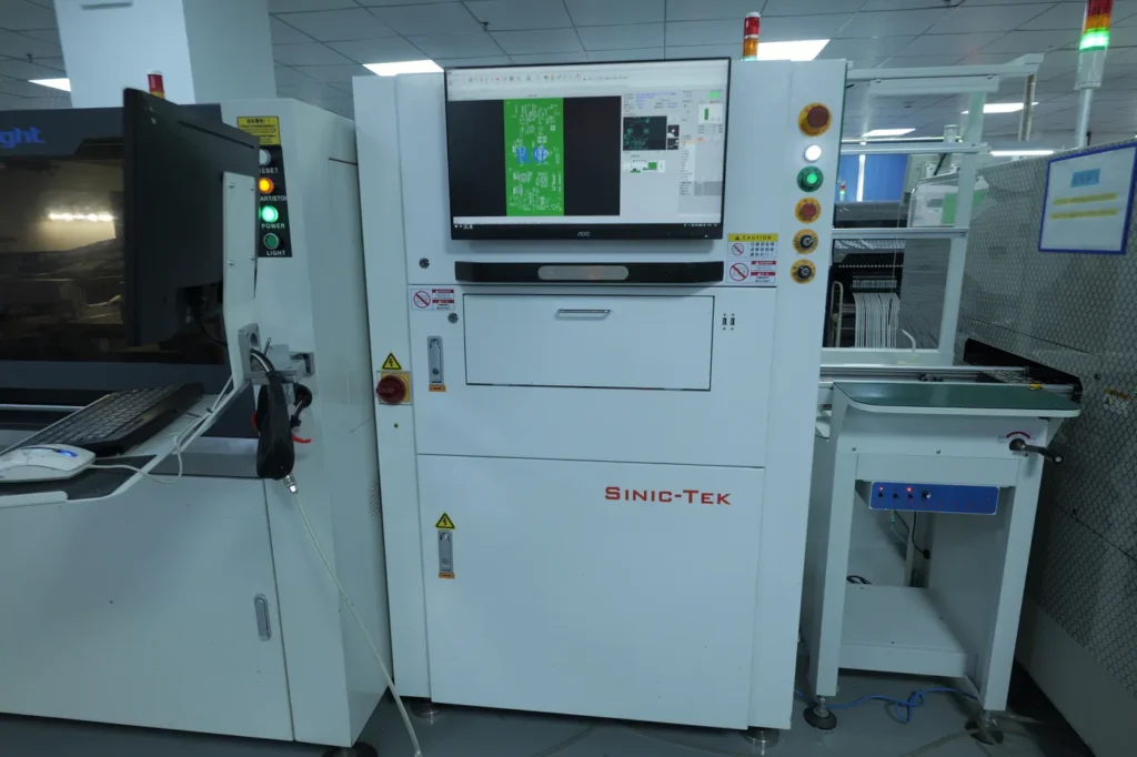 Solder paste inspection (SPI) machine in an SMT production line, verifying solder paste volume, area, and height on PCBs