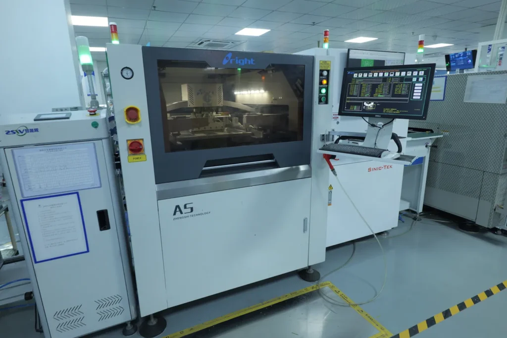 A5 solder paste printer in a PCB assembly line, performing stencil printing for surface mount production
